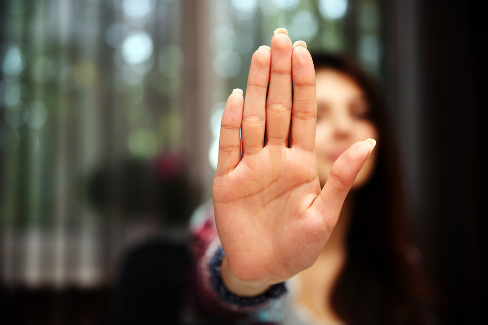 woman_with_extended_palm